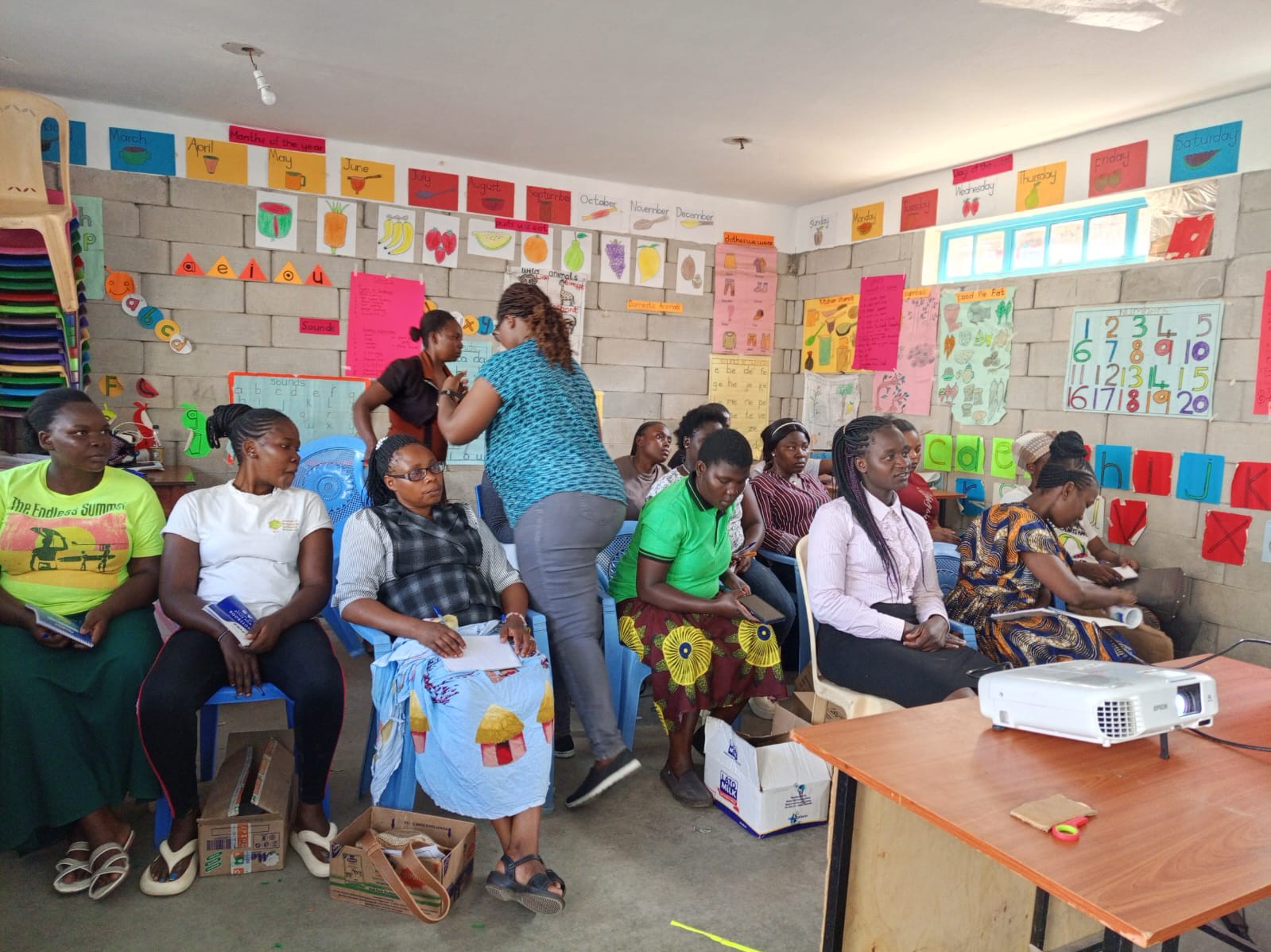MamaPlus trainer presenting to caregivers in a training session