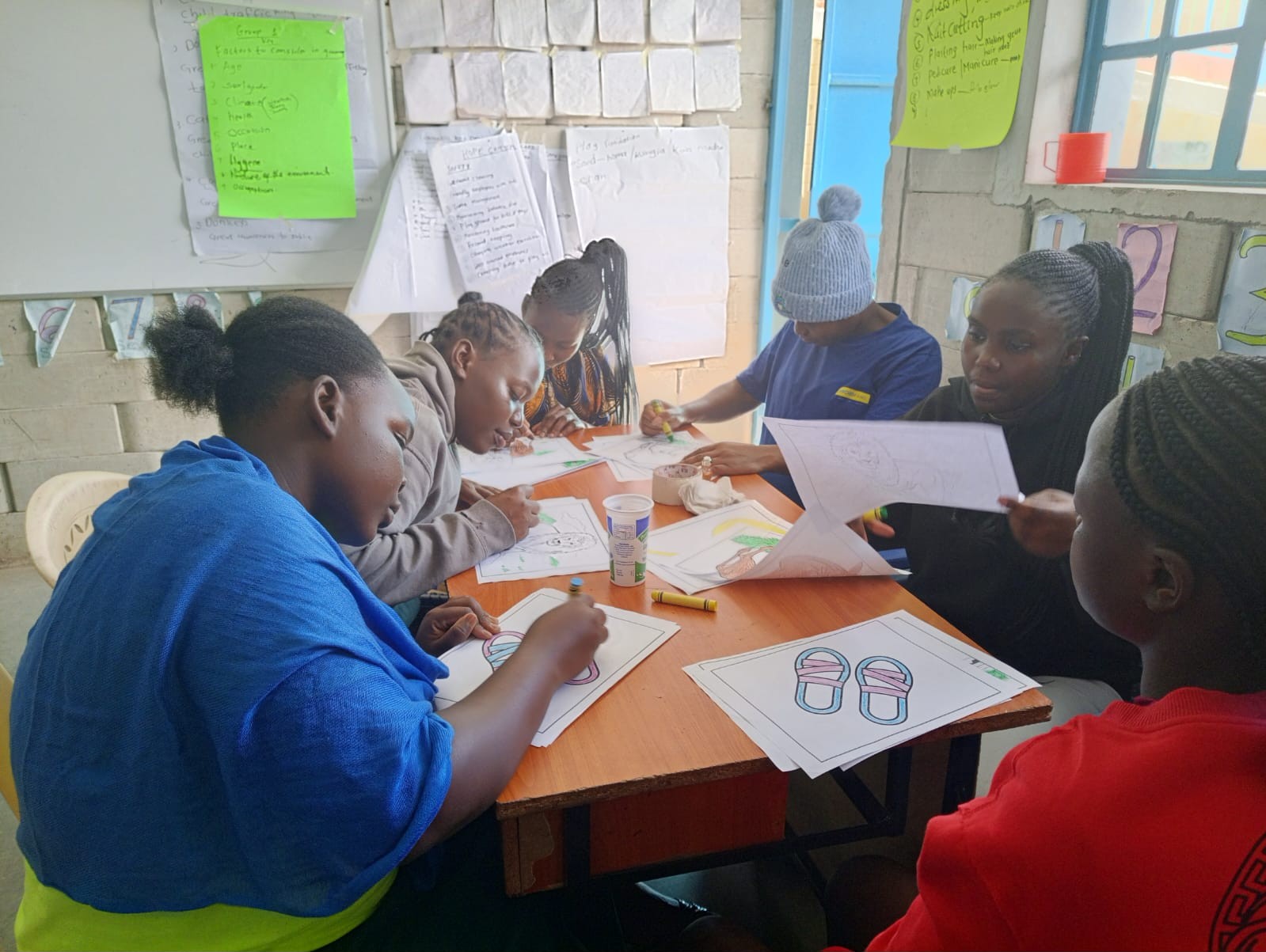 Caregivers in a vibrant classroom learning environment